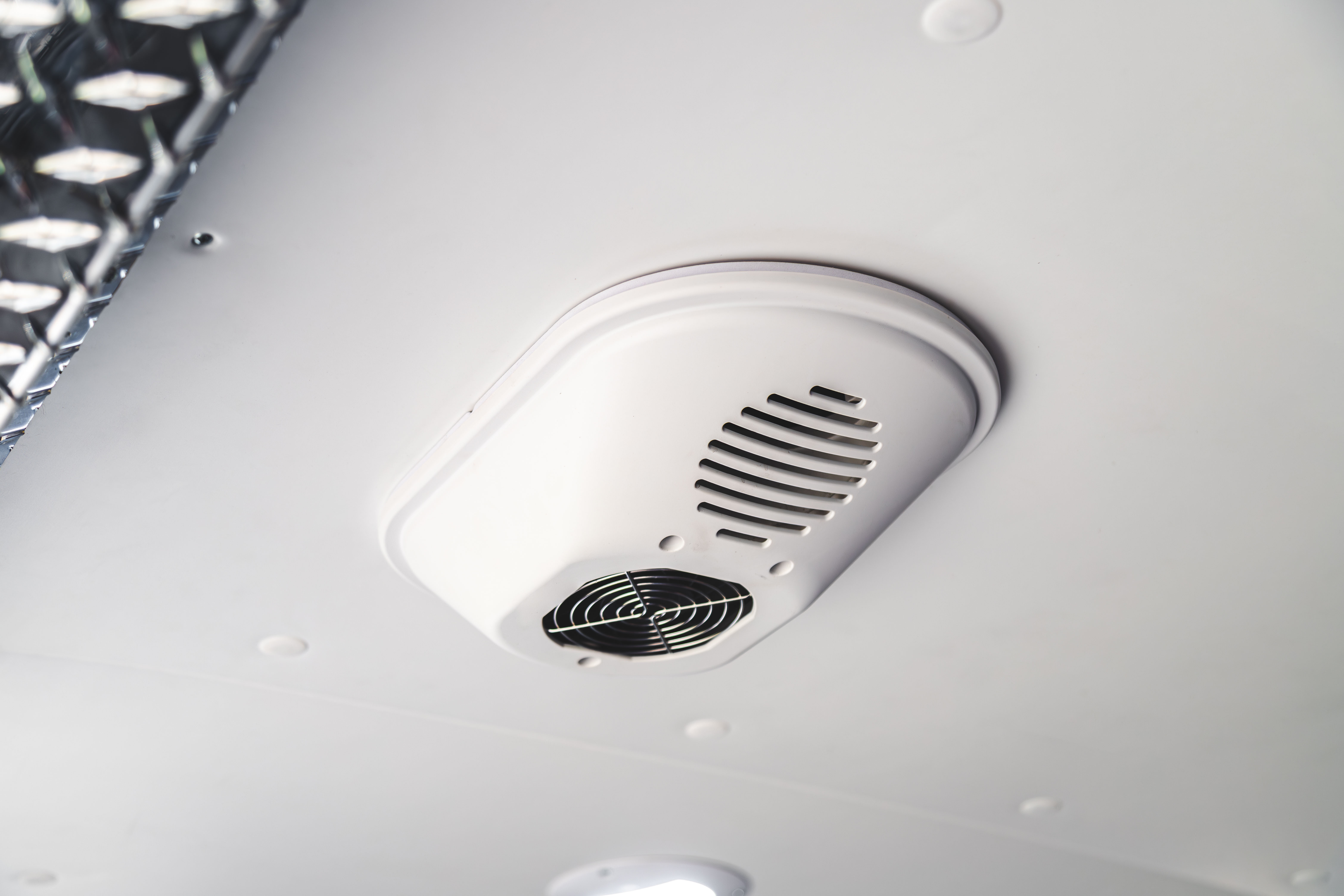 The VanFan seen from inside the cargo area, mounted in the van ceiling.
